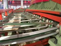 Станок для производства строганного шпона на выставке WMF 2010 в Пекине