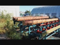 Рампа с механизмом поштучной выдачи бревен