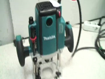 Ручной фрезер Макита RP 2300 FC