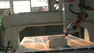 4-х осевой фрезерный станок с ЧПУ с автоматической сменой инструмента