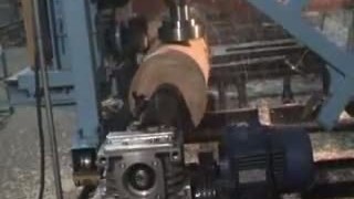 Обработка бревна на оцилиндровочном станке "АЛЬФА-2"
