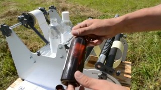 Ручной этикетировщик круглой тары. Механический аппликатор, наклейка этикеток