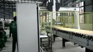 Портальный загрузчик для автоматической кромкооблицовочной линии