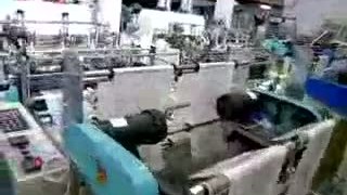 Машина для производства пакетов типа «майка» с термической резкой и сваркой. Модель 400X2.