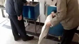 Машина для набивка пером одежды