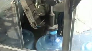 Линия розлива воды в 19 литровую бутыль 100-150 бутылок в час QGF-100